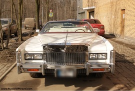 Rent Cars and Buses: Cadillac Eldorado White